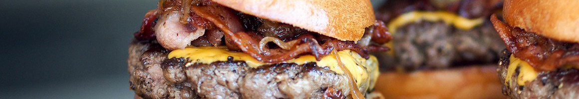 Eating American (Traditional) Burger at Downwind Restaurant and Lounge restaurant in Atlanta, GA.